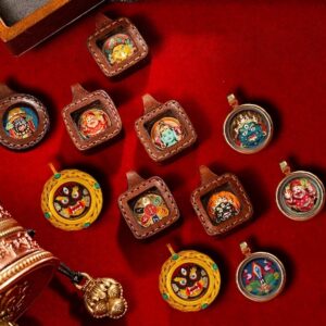 Collection of 3D hand-painted miniature Thangka Tsa-Tsa pendants featuring natural mineral pigments